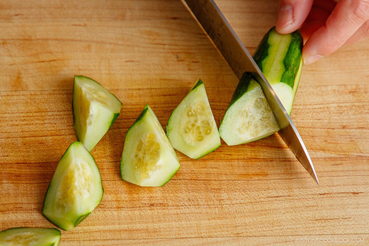 Cutting cucumber in rangiri Japanese cutting technique.