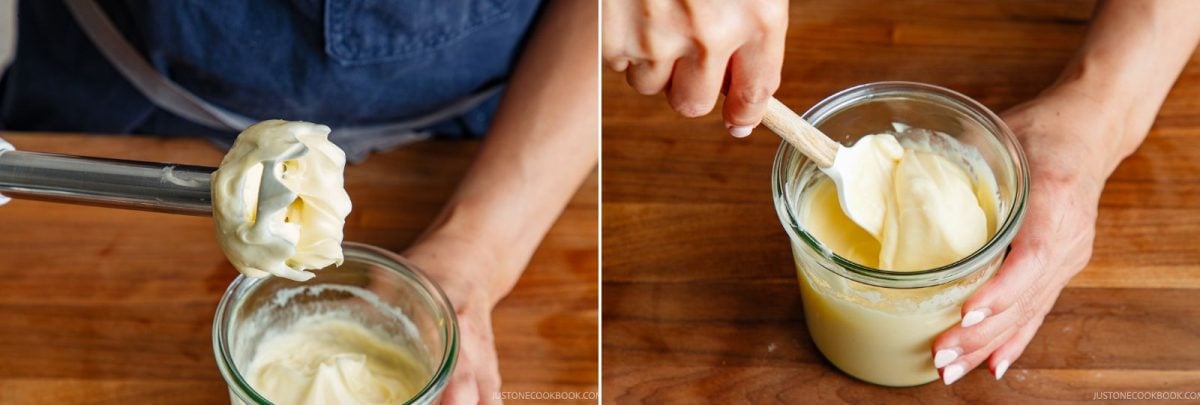 Two images: One shows a hand holding an immersion blender with thick mayonnaise. The other shows a hand stirring creamy mayonnaise in a glass jar with a spatula, all on a wooden surface.