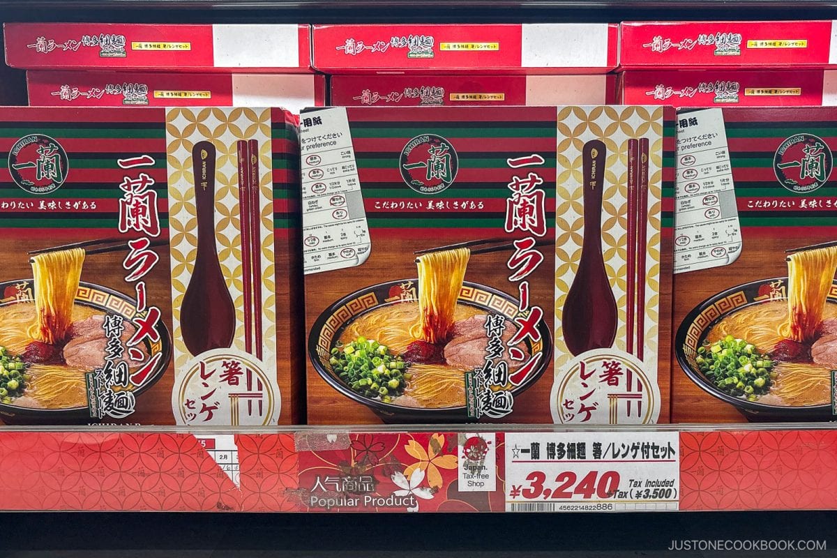 Ichiran ramen gift sets on a store shelf in Japan, priced at ¥3,240. Red boxes feature Hakata-style thin noodles with chopsticks and spoon sets included—perfect for experiencing some of the best instant ramen in Japan right at home.
