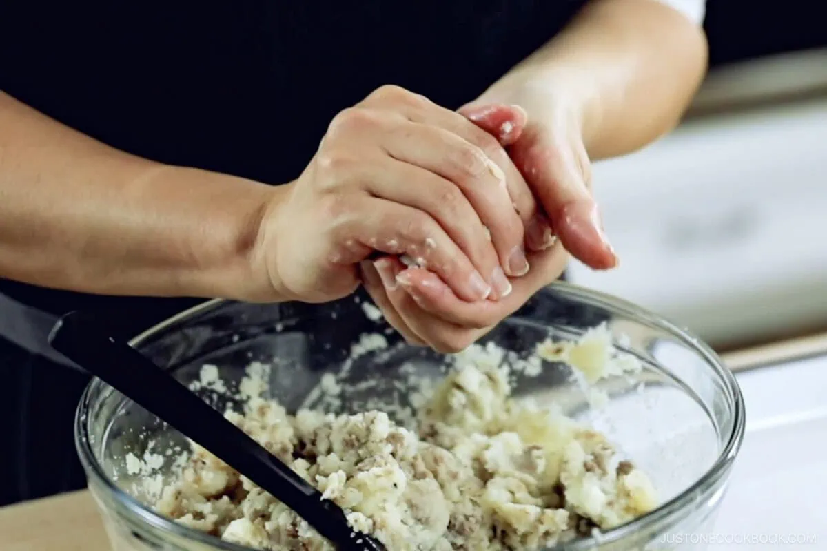 Forming the mixture into an oval shape.