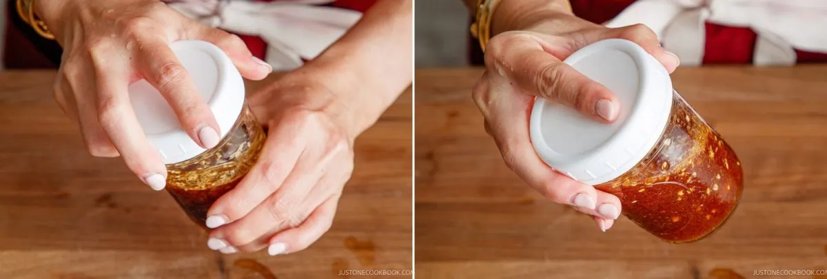 Two images show hands holding and shaking a glass jar with a white lid, filled with a reddish-brown wafu dressing, over a wooden surface.